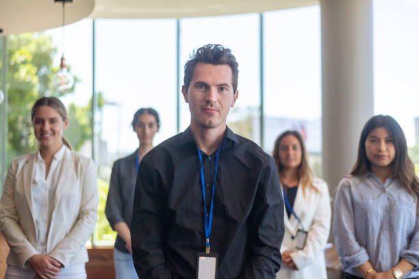 istock Multi-ethnic team of business professionals attending a conference 1293373222