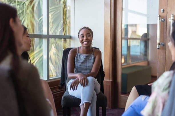 Hopeful woman in group therapy session