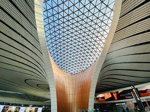 Beijing, China- December 25, 2020: Beijing Daxing International Airport is the newly opened airport in Beijing and the terminal building designed by Zaha Hadid is goegeous. Here is the internal view of the Terminal