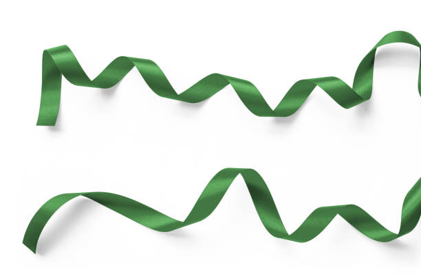 istock Green ribbon satin scroll bow set isolated on white background with clipping path for Christmas holiday and greeting card confetti design decoration 1293376267