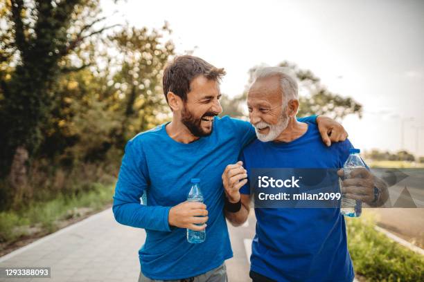 Two Men Exercising Stock Photo - Download Image Now - Healthy Lifestyle, Exercising, Men