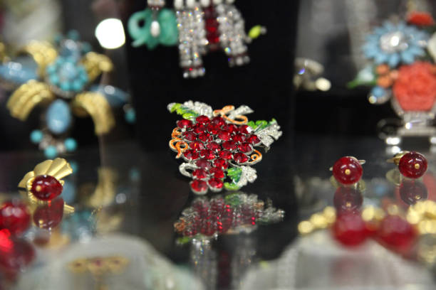 istock Showcase, Table with sparkling berry women's jewelry 1293388155