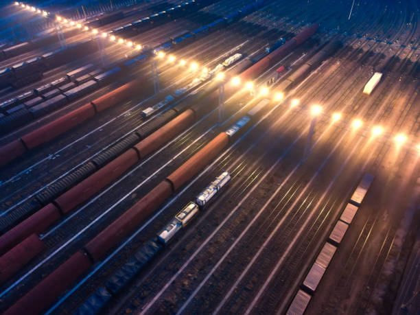 Aerial View Freight Transportation At Night Aerial View Freight Transportation At Night railroad car photos stock pictures, royalty-free photos & images