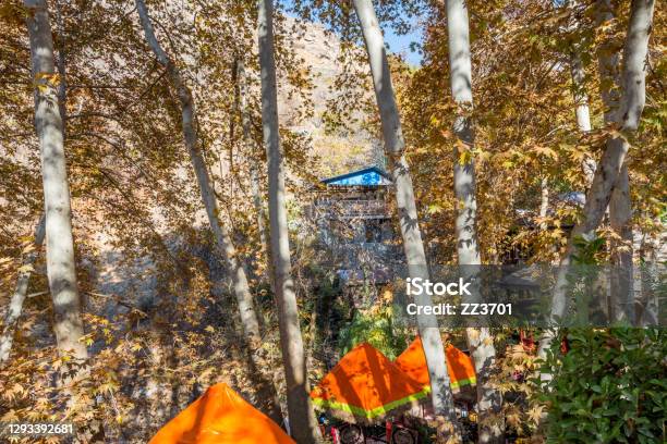 Iranian Restaurants Covered By Golden Leaves In Entrance Of Darband Valley Of The Tochal Mountain A Popular Recreational Region For Tehrans Residents Stock Photo - Download Image Now