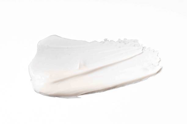 istock white cosmetic face cream texture on white background 1293398092
