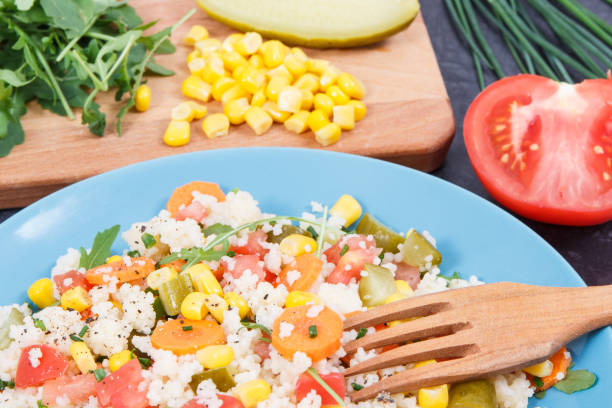 istock Fresh salad with couscous and vegetables. Light dietary vegan meal 1293399631