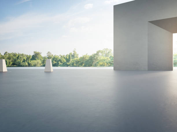 istock Empty concrete floor for car park and gray wall. 1293404226