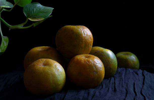 istock Heap of Orange fruit with selective focus 1293407153