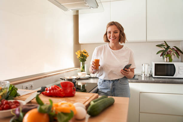 istock Woman looking at the window 1293417960