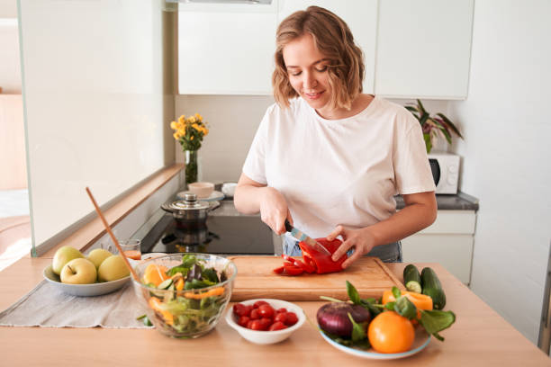 istock Girl preparing vegetables for the future salad 1293417976