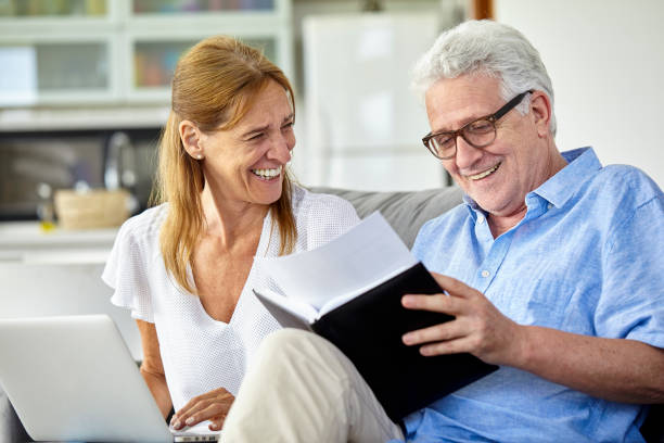 istock Senior couple doing home finances together 1293418073