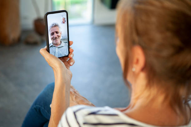 istock Wife talking with her husband on video call 1293418103