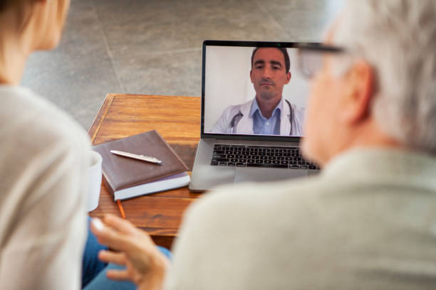 istock Mature couple doing telemedicine 1293418540