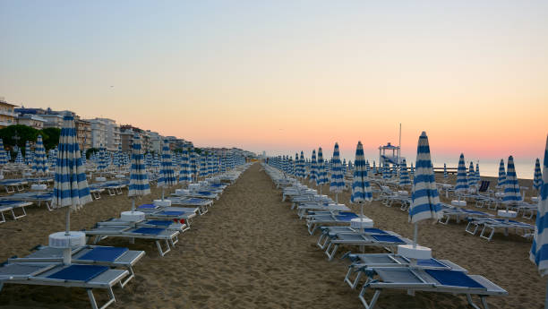 istock the sun rises on the still deserted beach 1293421209