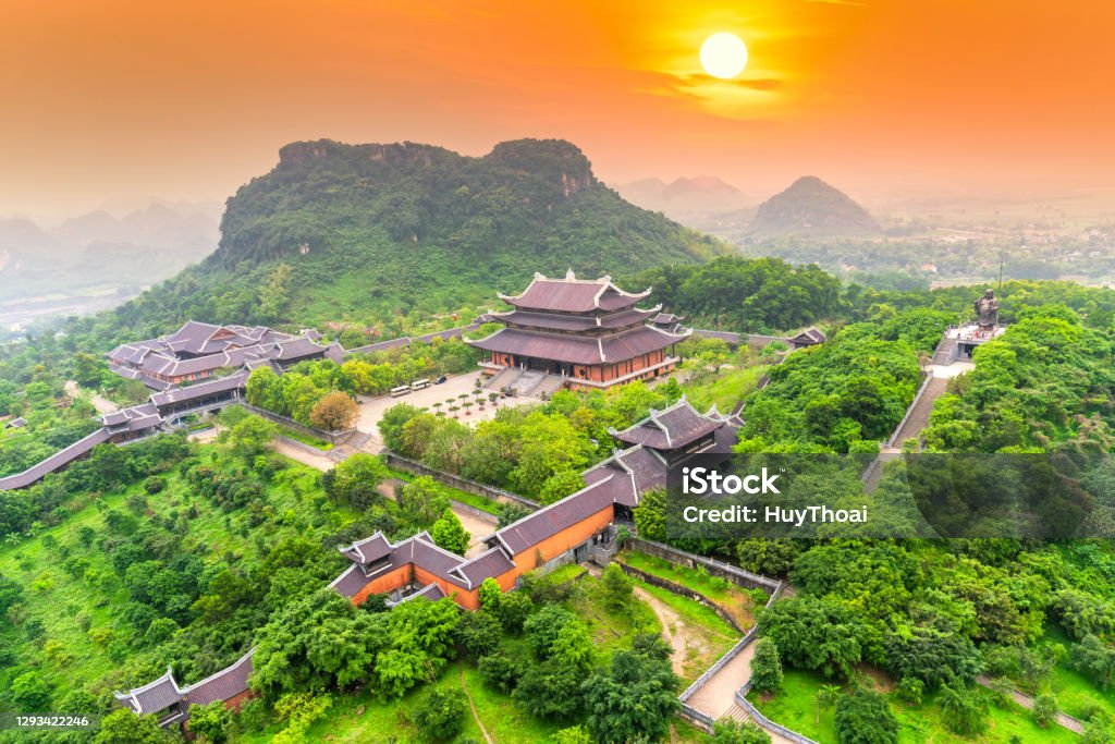Sunset landscape of Bai Dinh temple complex from above Sunset landscape of Bai Dinh temple complex from above is one of the biggiest and largest temple Southeast Asia in Ninh Binh, Vietnam. Vietnam Stock Photo