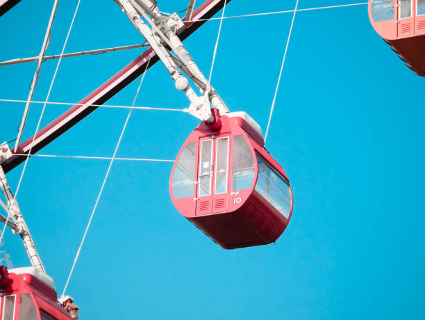 istock Low Angle View Of Ferris Wheel Against Blue Sky 1293427301