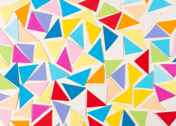 istock Colourful paper mosaic on light background. Abstract wallpaper. Geometric background. 1293434883