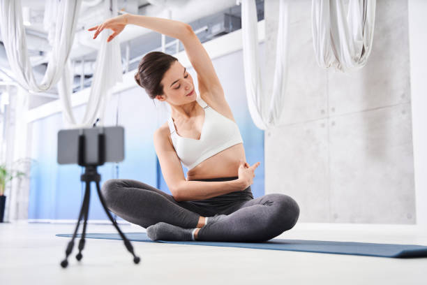 istock Woman raising her hand up 1293437889