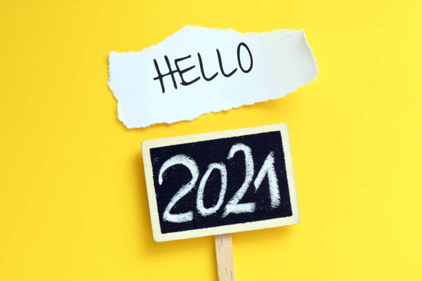 istock Hello 2021 year concept text. The beginning of a new year, new plans, challenges. 1293439124