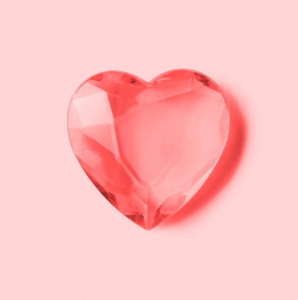 istock Pink  diamond heart on light pink background. 1293440069
