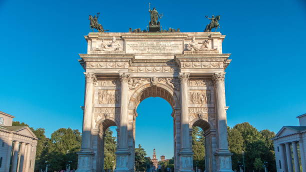 istock Arch of Peace in Simplon Square timelapse at sunset. It is a neoclassical triumph arch 1293440708
