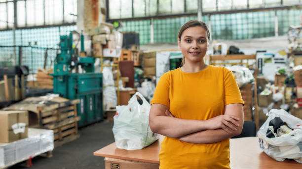 istock Young caucasian woman standing on garbage station 1293441067