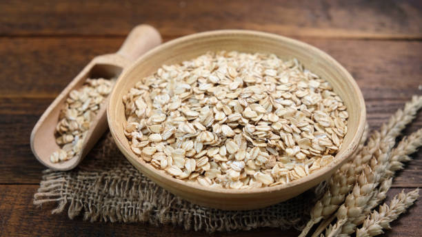 istock Rolled oats in a wooden bowl 1293442149