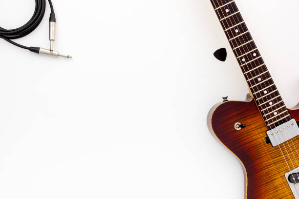 istock Musician work set with guitar, note and headphones 1293442201