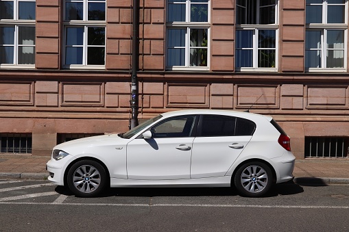 BMW 1 series compact car parked in Germany. There were 45.8 million cars registered in Germany (as of 2017).