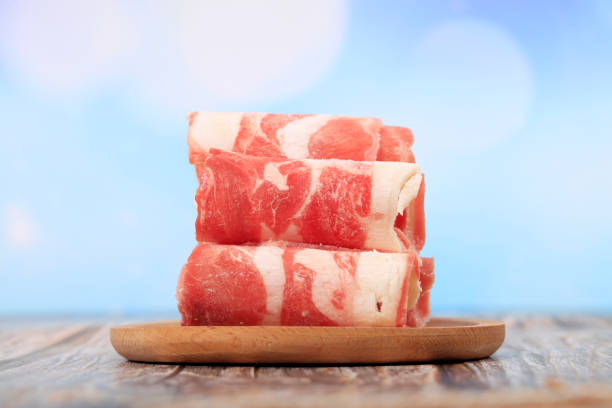 fresh mutton for hot pot, chinese food, Fresh mutton was rolled up on a plate Mutton rolls, fresh mutton for hot pot, chinese food, Fresh mutton was rolled up on a plate mutton roll for chinese hot pot stock pictures, royalty-free photos & images