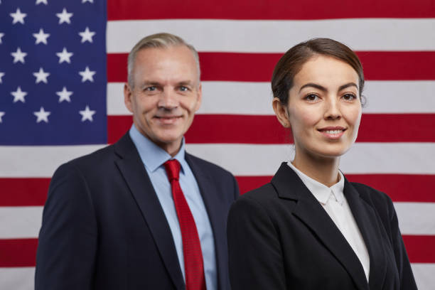 istock Smiling Politicians against American Flag 1293444913