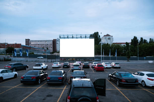 istock Cars parked in autocinema during evening session 1293448082