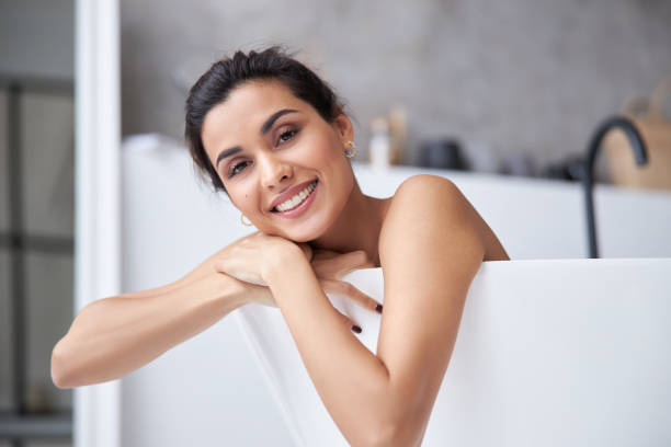 istock Female lying in hot water and relaxing 1293448346