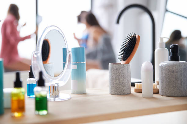 istock Face care bottles on wooden counter table 1293448404