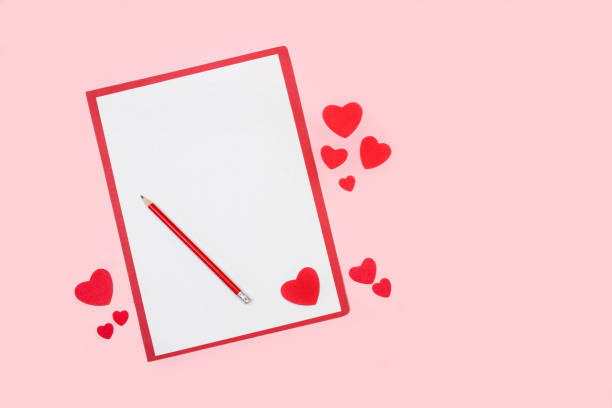 istock A valentine´s card with copy space and red paper hearts 1293449012