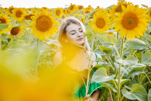 istock girl in sunflowers 1293450154