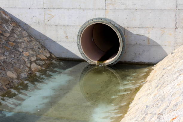 Large air valve of the metal pipe which croosing the canal in the urban area.