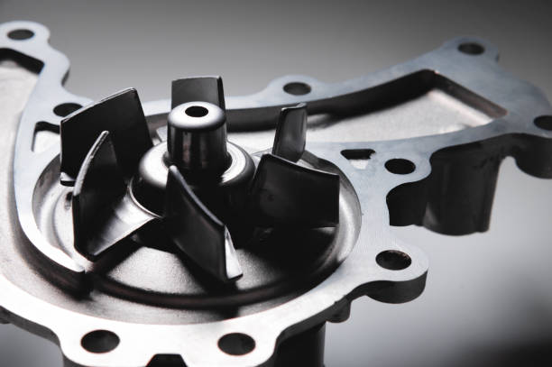 istock ICE liquid cooling pump. Engine coolant pump. Contrast light on gray background 1293459788