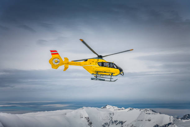 istock rescue helicopter in winter landscape in Austria 1293462925