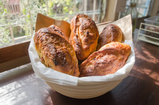 istock New baked bread in a wicker basket 1293463524