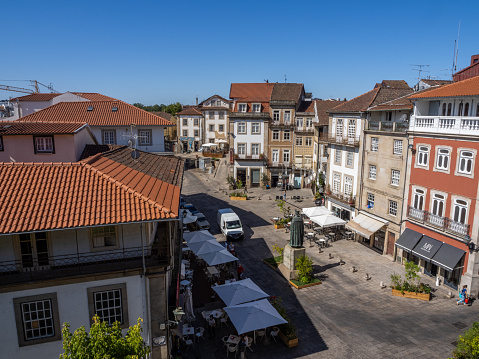 View over one of the oldest and most important squares in the city, D. Duarte Square, with the King D. Duarte statue, from the majestic Canons Walk. Viseu, Portugal.