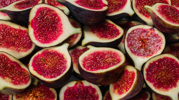 istock Tasty figs background. Top view. 1293466668