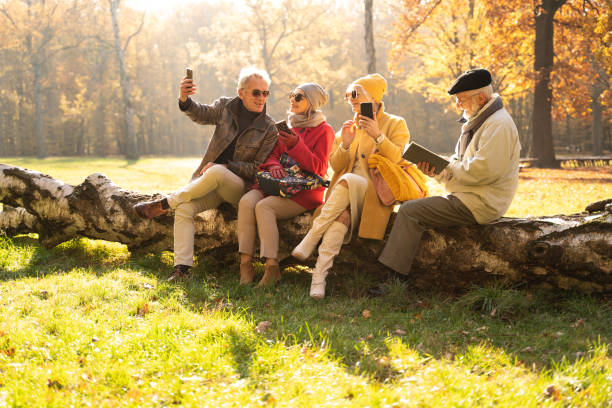 istock Retired friends spending time together outdoor. 1293468073