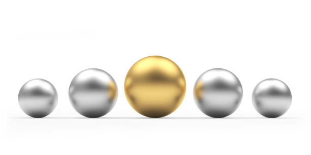 istock Silver and one gold spheres are sized 1293468907