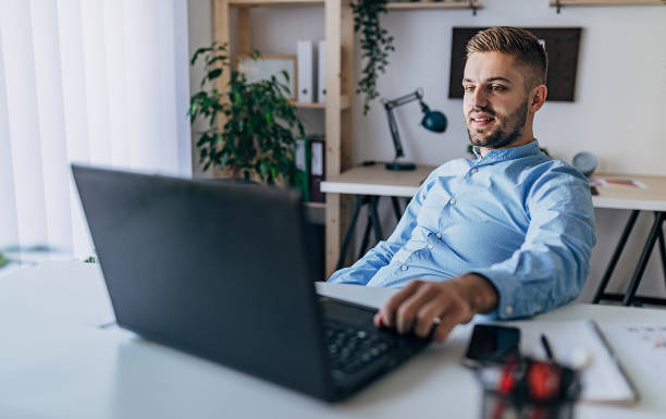 istock Young business man working with laptop 1293469929
