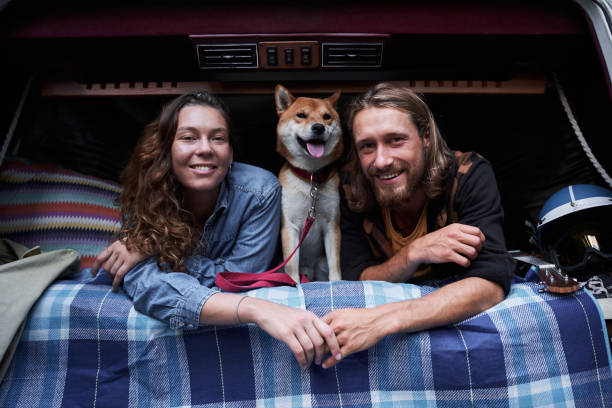 istock Couple resting with their dog 1293470180