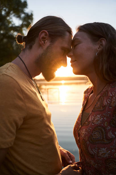 istock Couple embracing and looking at each other 1293470249