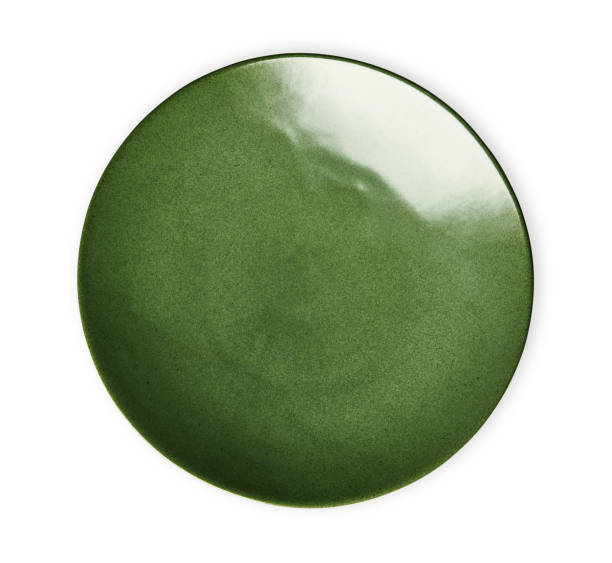istock Green ceramic plate, Empty plate with marble texture, isolated on white background with clipping path, Top view 1293470919
