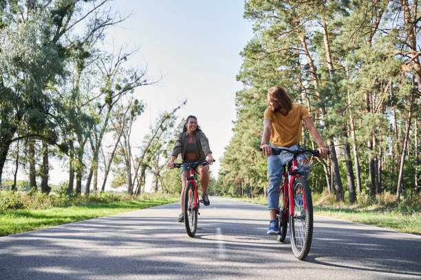 istock Couple having walk with bike 1293472760