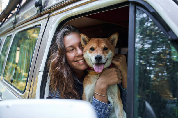 istock Woman embracing her pet 1293472817